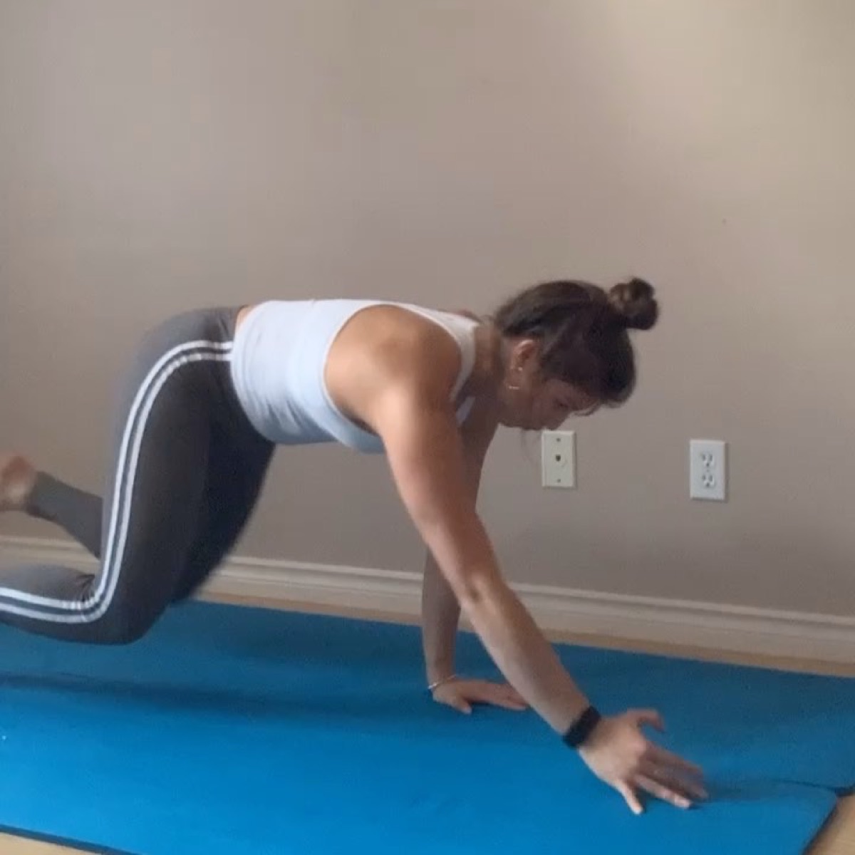 Wendy training on a mat at home